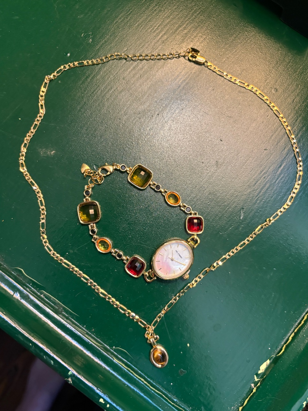 Gold Tone Watch Bracelet with Multi-Color Gem Accents and Gold Necklace